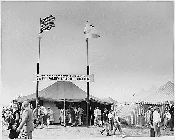 Photograph of the Office of Civil and Defense Mobilization exhibit at a local civil defense fair. ca. 1960