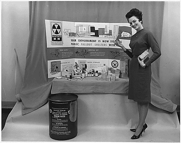 Photograph of a display of survival supplies for the well-stocked fallout shelter, ca.1961.