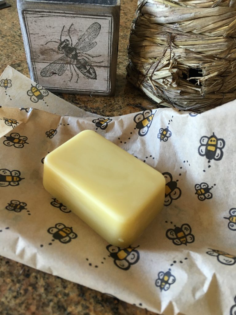 Homemade beeswax beard balm in a bar